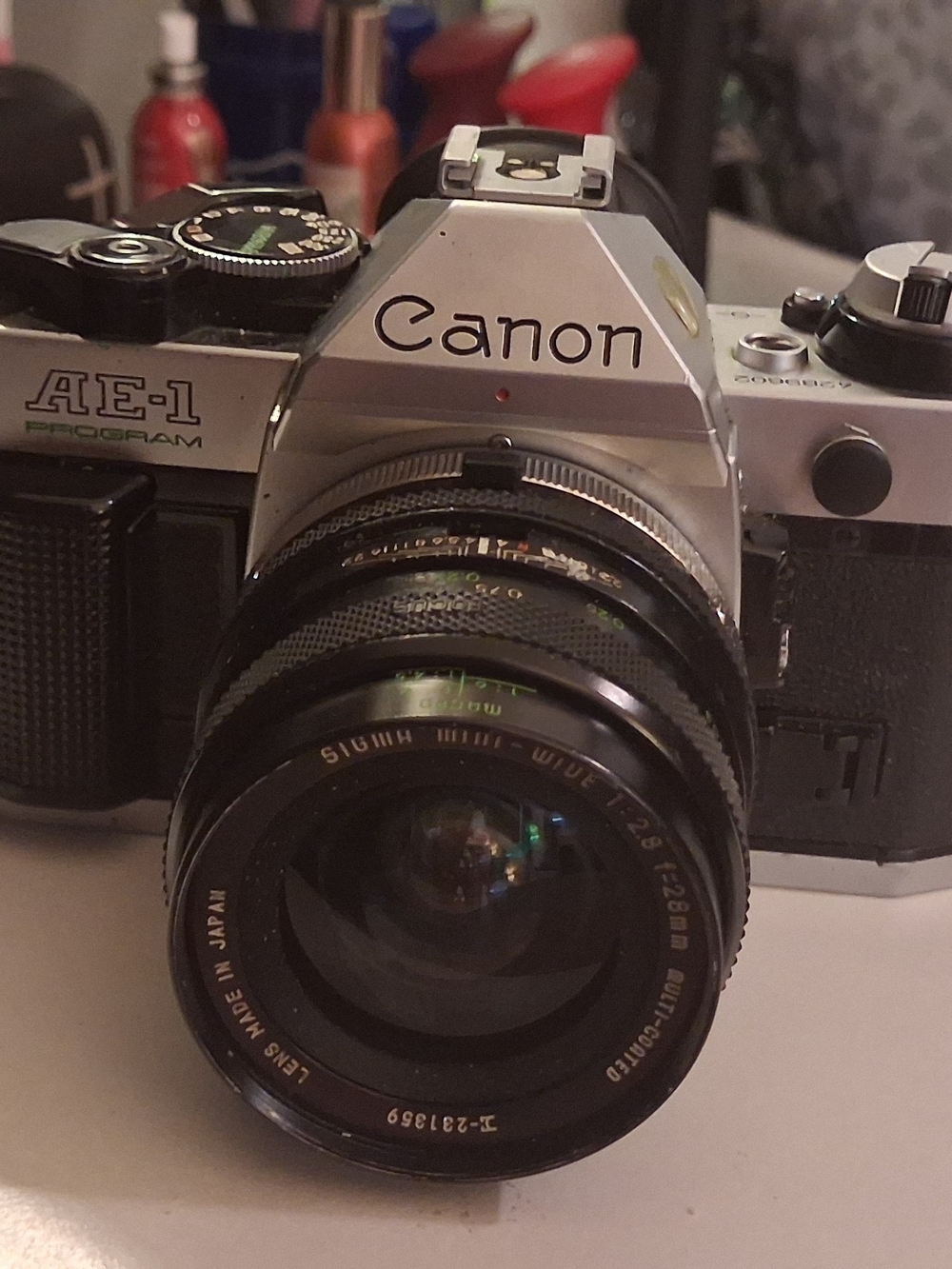 Canon Silver and Black AE-1 Program 35mm SLR with Black Lens (Canon)